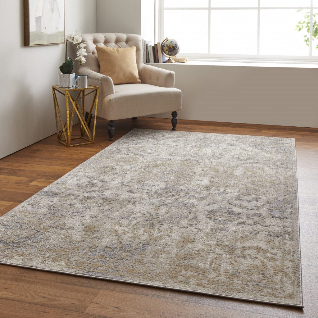 4' X 6' Blue Gray And Ivory Floral Power Loom Distressed Area Rug