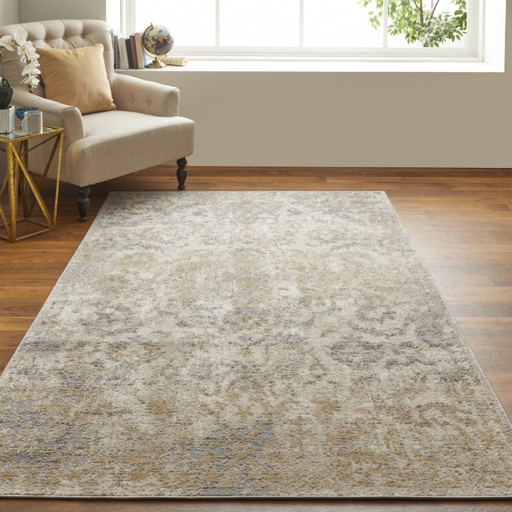 4' X 6' Blue Gray And Ivory Floral Power Loom Distressed Area Rug