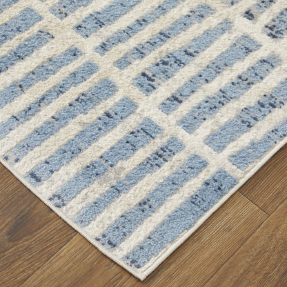 4' X 6' Blue And Ivory Geometric Power Loom Distressed Area Rug