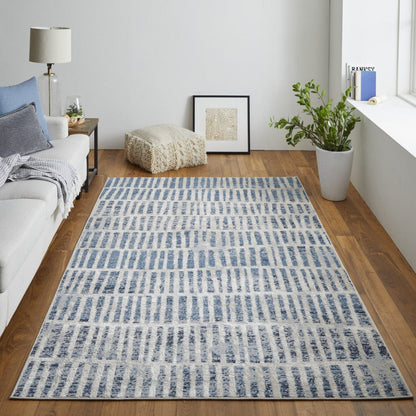 4' X 6' Blue And Ivory Geometric Power Loom Distressed Area Rug