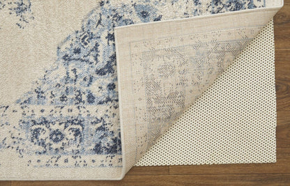 5' X 8' Ivory And Blue Floral Power Loom Distressed Area Rug