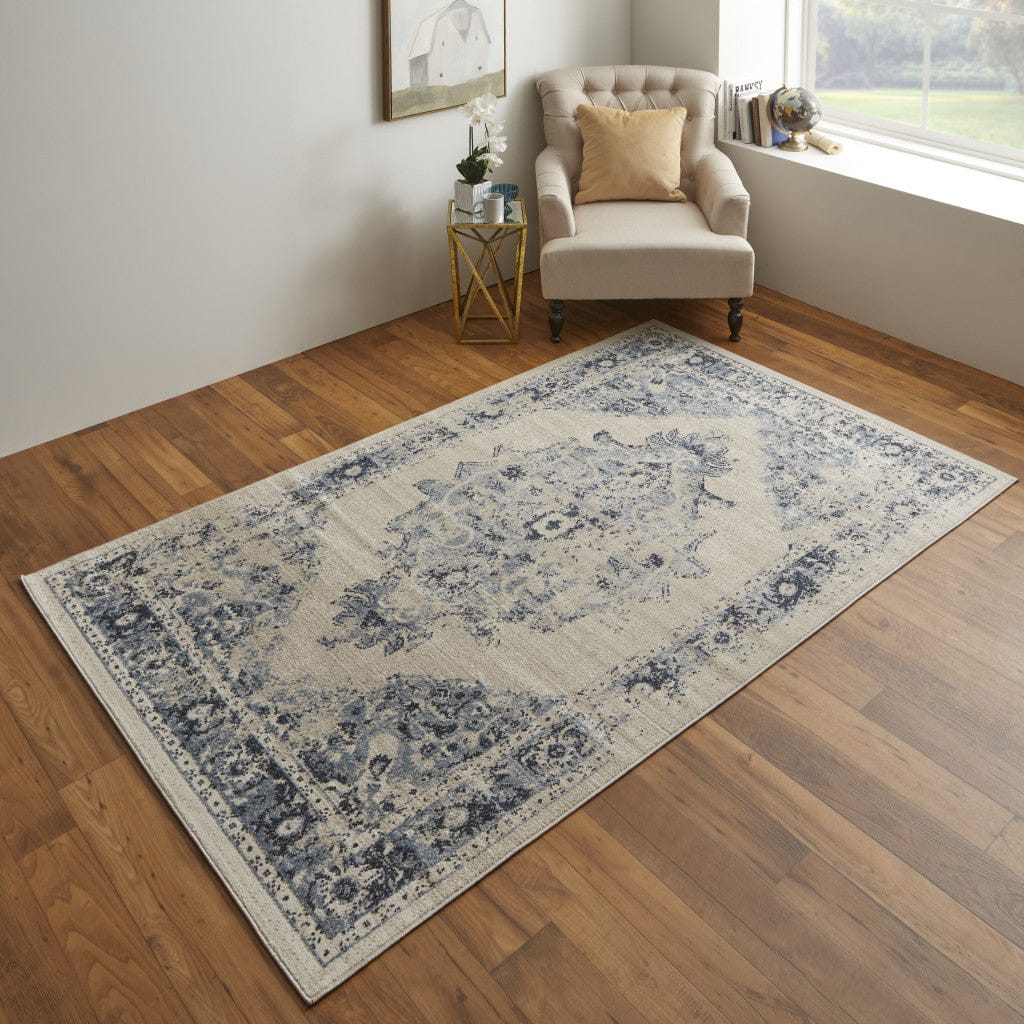 5' X 8' Ivory And Blue Floral Power Loom Distressed Area Rug