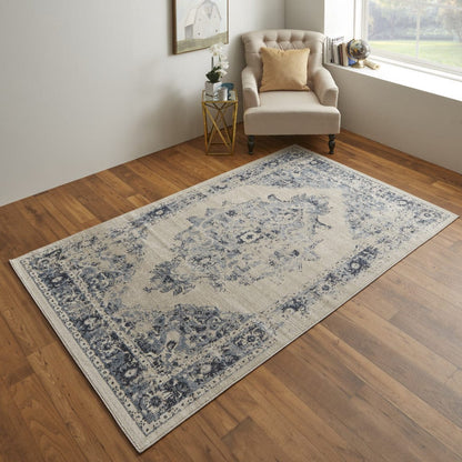 5' X 8' Ivory And Blue Floral Power Loom Distressed Area Rug
