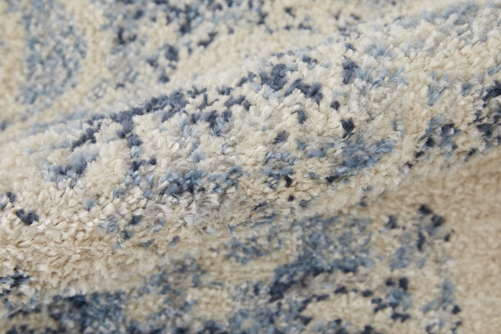 5' X 8' Ivory And Blue Floral Power Loom Distressed Area Rug