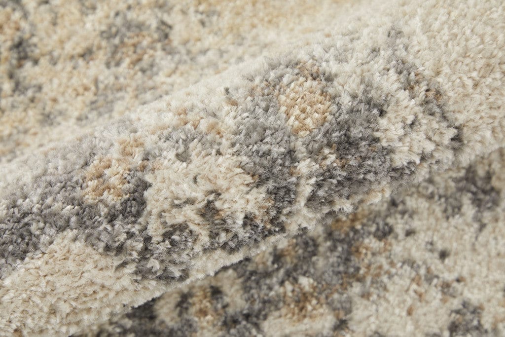 5' X 8' Ivory And Blue Floral Power Loom Distressed Area Rug