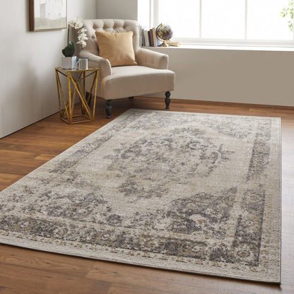 5' X 8' Ivory And Blue Floral Power Loom Distressed Area Rug