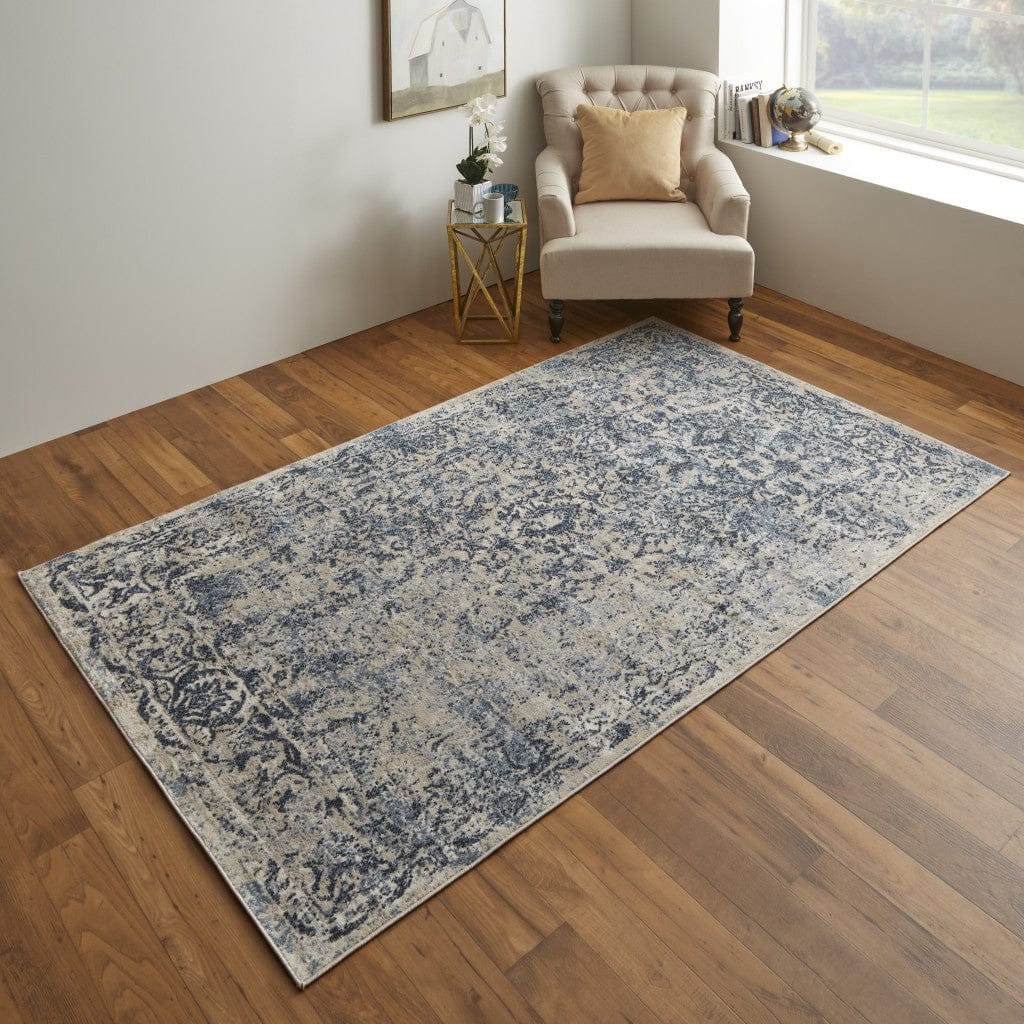 4' X 6' Blue And Ivory Floral Power Loom Distressed Area Rug