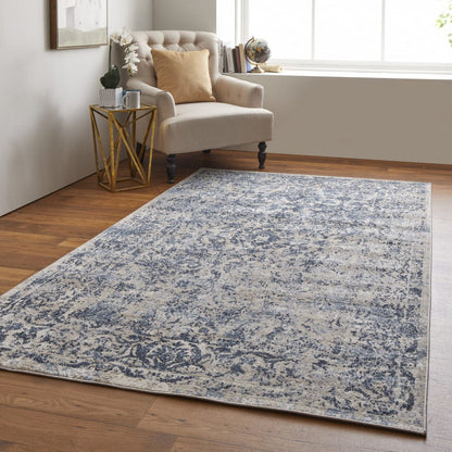 4' X 6' Blue And Ivory Floral Power Loom Distressed Area Rug