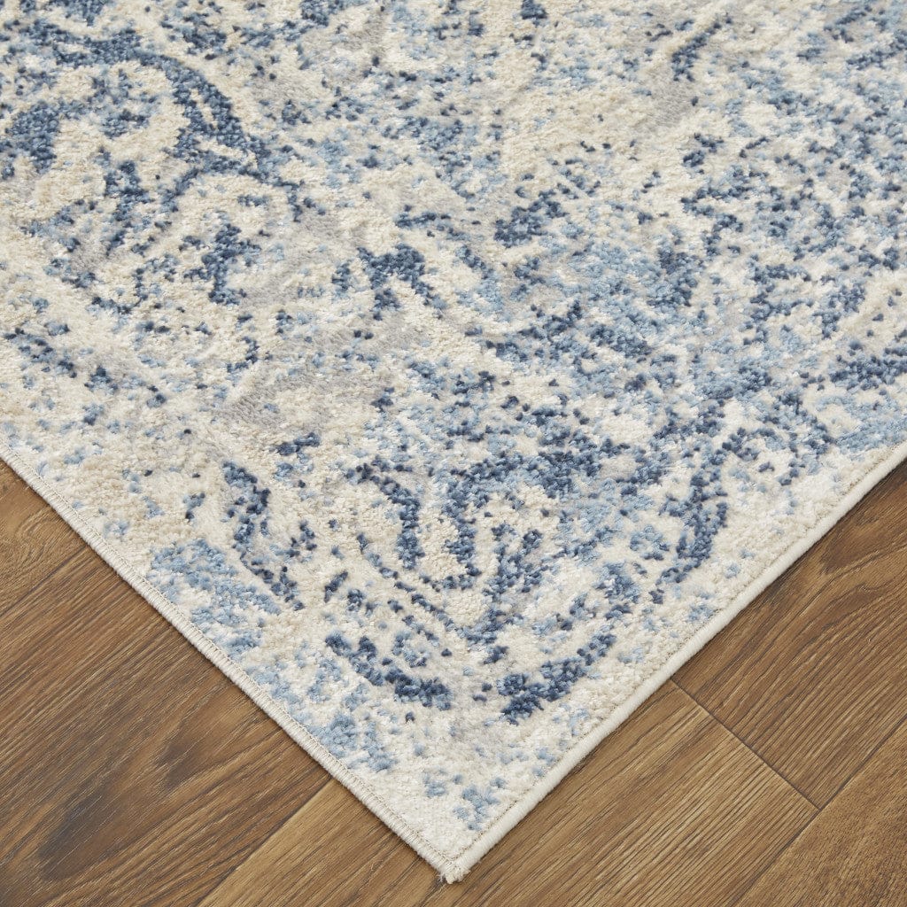 4' X 6' Blue And Ivory Floral Power Loom Distressed Area Rug