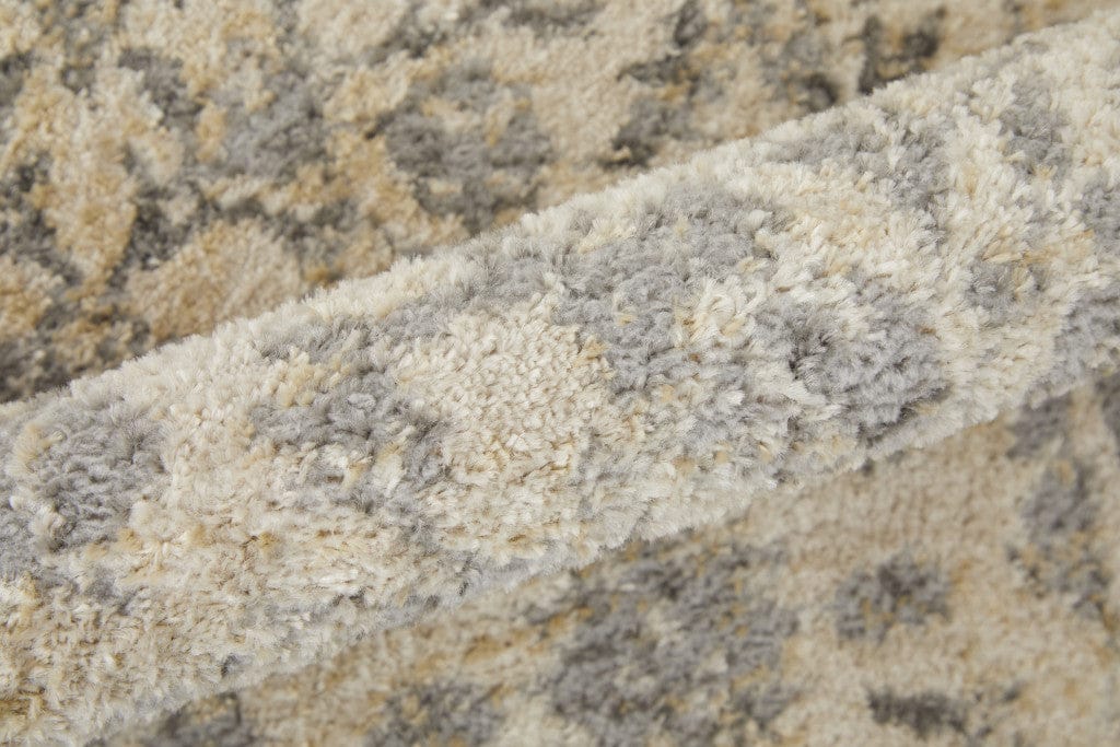 4' X 6' Blue And Ivory Floral Power Loom Distressed Area Rug