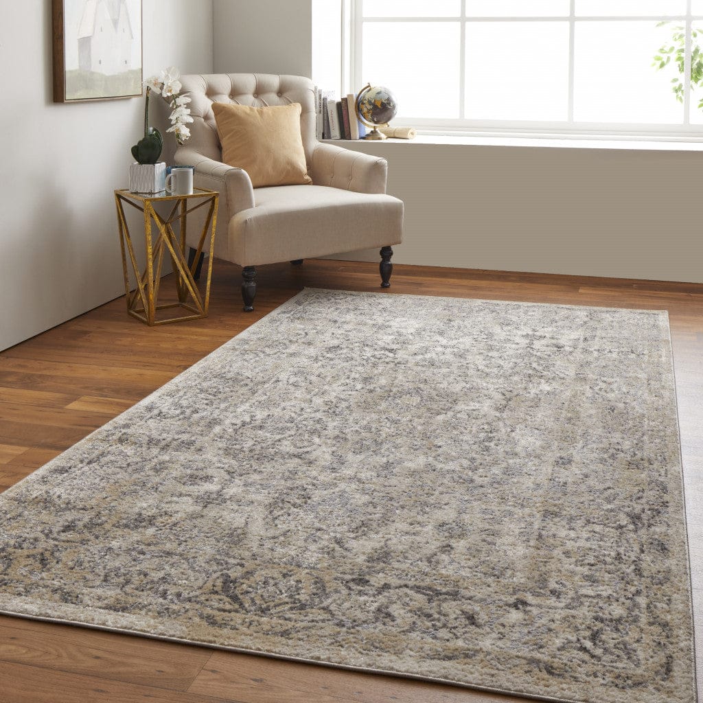 4' X 6' Blue And Ivory Floral Power Loom Distressed Area Rug