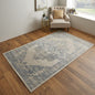 4' X 6' Blue And Ivory Floral Power Loom Distressed Area Rug