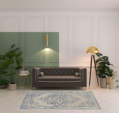 4' X 6' Blue And Ivory Floral Power Loom Distressed Area Rug