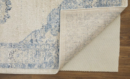 4' X 6' Blue And Ivory Floral Power Loom Distressed Area Rug