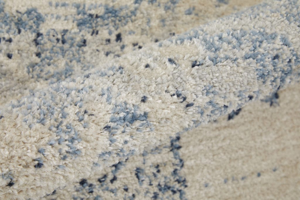 4' X 6' Blue And Ivory Floral Power Loom Distressed Area Rug