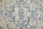 4' X 6' Blue And Ivory Floral Power Loom Distressed Area Rug