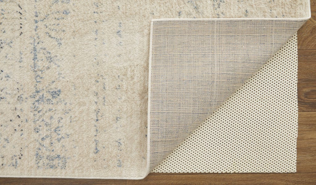 4' X 6' Ivory And Gray Abstract Power Loom Distressed Area Rug