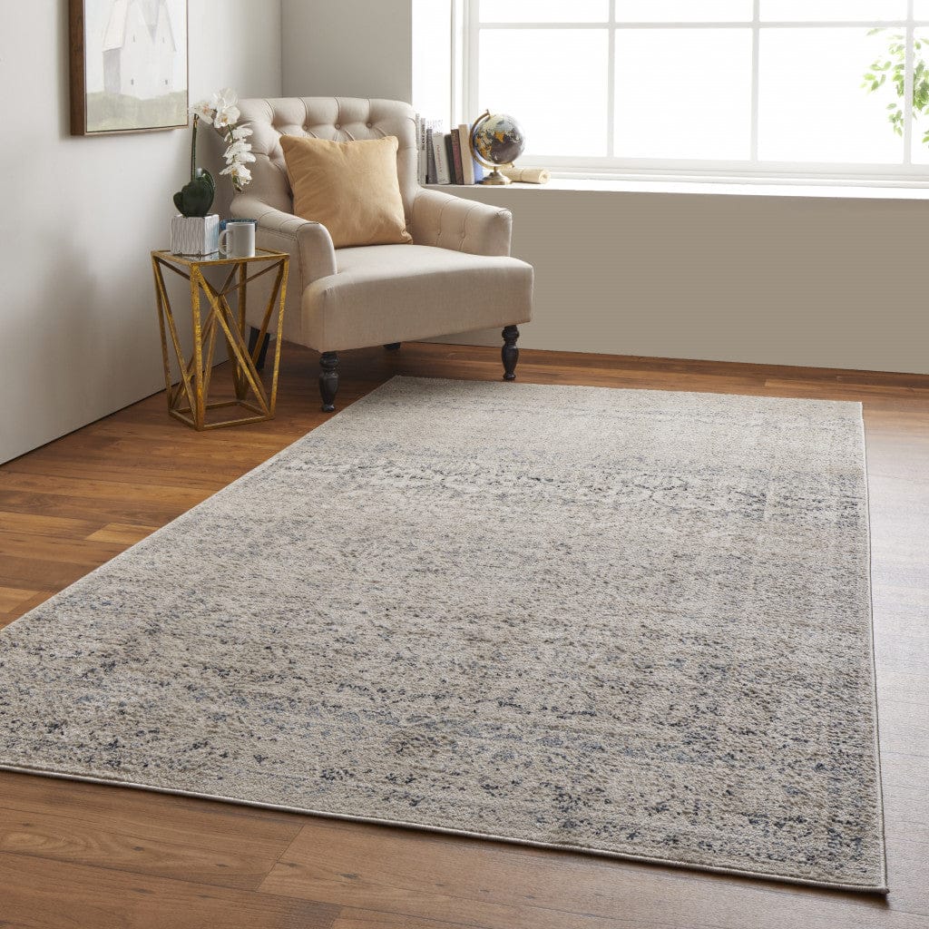 4' X 6' Ivory And Gray Abstract Power Loom Distressed Area Rug
