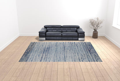 3' X 5' Blue And Ivory Abstract Power Loom Stain Resistant Area Rug