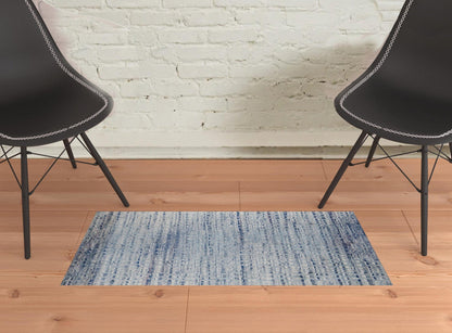 3' X 5' Blue And Ivory Abstract Power Loom Stain Resistant Area Rug