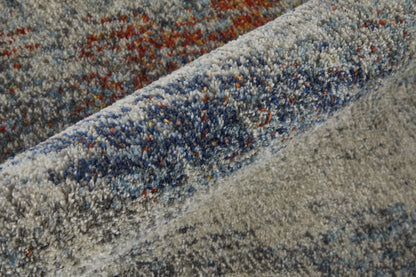 3' X 5' Ivory Orange And Blue Abstract Power Loom Stain Resistant Area Rug