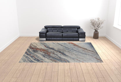 3' X 5' Ivory Orange And Blue Abstract Power Loom Stain Resistant Area Rug