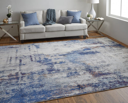 3' X 5' Ivory And Blue Abstract Power Loom Distressed Stain Resistant Area Rug