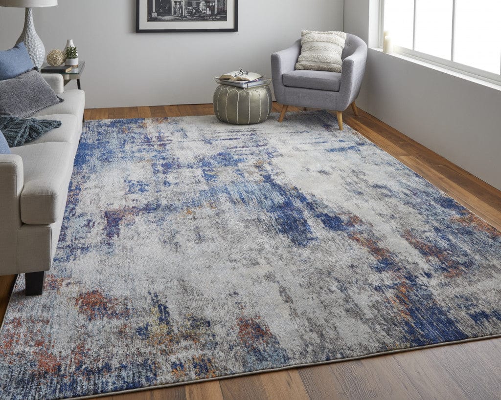 3' X 5' Ivory And Blue Abstract Power Loom Distressed Stain Resistant Area Rug