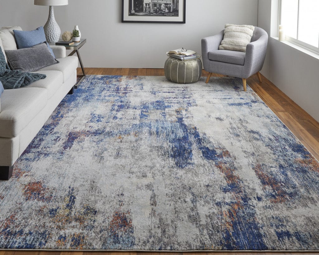 3' X 5' Ivory And Blue Abstract Power Loom Distressed Stain Resistant Area Rug