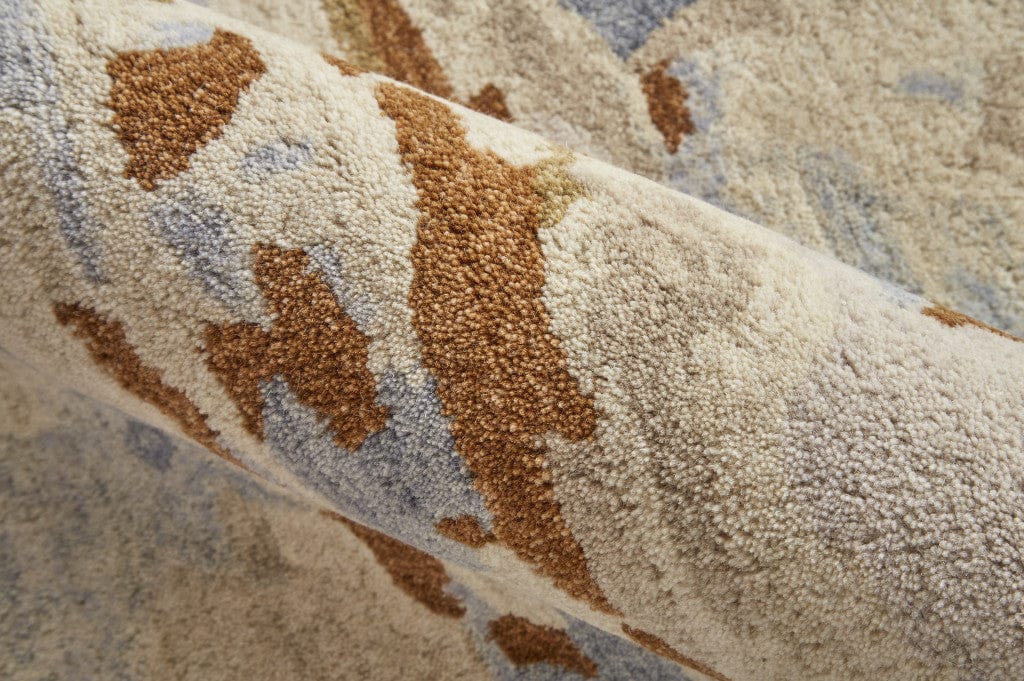 4' X 6' Tan And Blue Wool Abstract Tufted Handmade Stain Resistant Area Rug