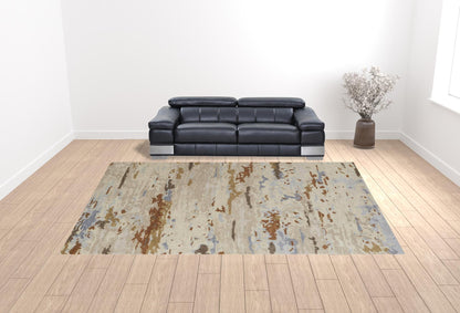 4' X 6' Tan And Blue Wool Abstract Tufted Handmade Stain Resistant Area Rug