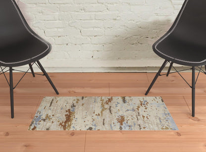 4' X 6' Tan And Blue Wool Abstract Tufted Handmade Stain Resistant Area Rug