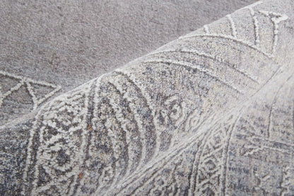 4' X 6' Gray Ivory And Orange Geometric Power Loom Distressed Stain Resistant Area Rug