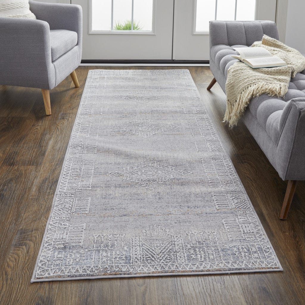 4' X 6' Gray Ivory And Orange Geometric Power Loom Distressed Stain Resistant Area Rug