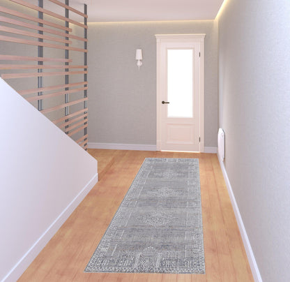 4' X 6' Gray Ivory And Orange Geometric Power Loom Distressed Stain Resistant Area Rug