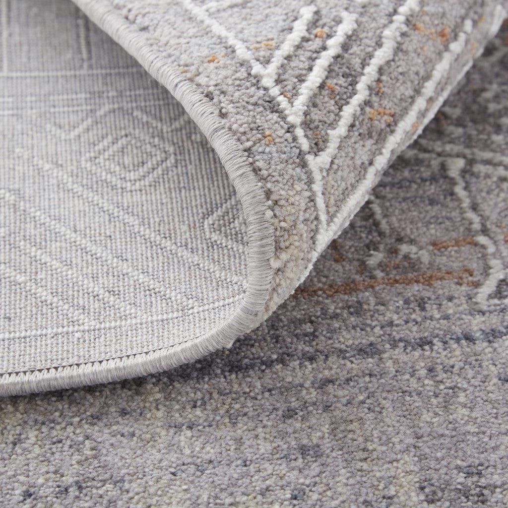 4' X 6' Gray Ivory And Orange Geometric Power Loom Distressed Stain Resistant Area Rug