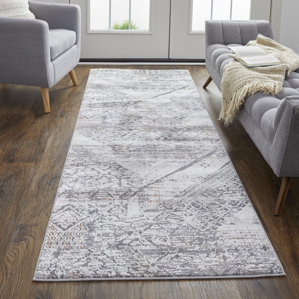 4' X 6' Ivory And Gray Geometric Power Loom Distressed Stain Resistant Area Rug