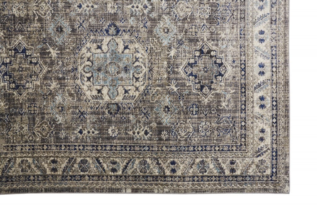 5' X 8' Taupe Gray And Blue Floral Stain Resistant Area Rug
