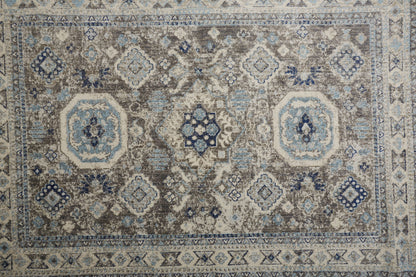 5' X 8' Gray Brown And Blue Floral Stain Resistant Area Rug