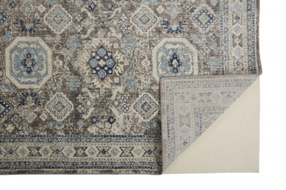 5' X 8' Gray Brown And Blue Floral Stain Resistant Area Rug