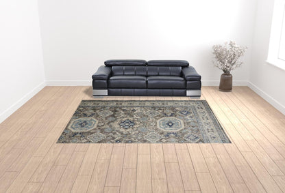 5' X 8' Gray Brown And Blue Floral Stain Resistant Area Rug