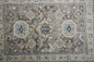 5' X 8' Gray Brown And Blue Floral Stain Resistant Area Rug