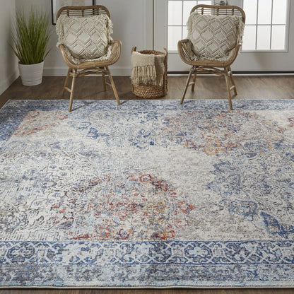 5' X 8' Blue Ivory And Red Floral Power Loom Distressed Stain Resistant Area Rug