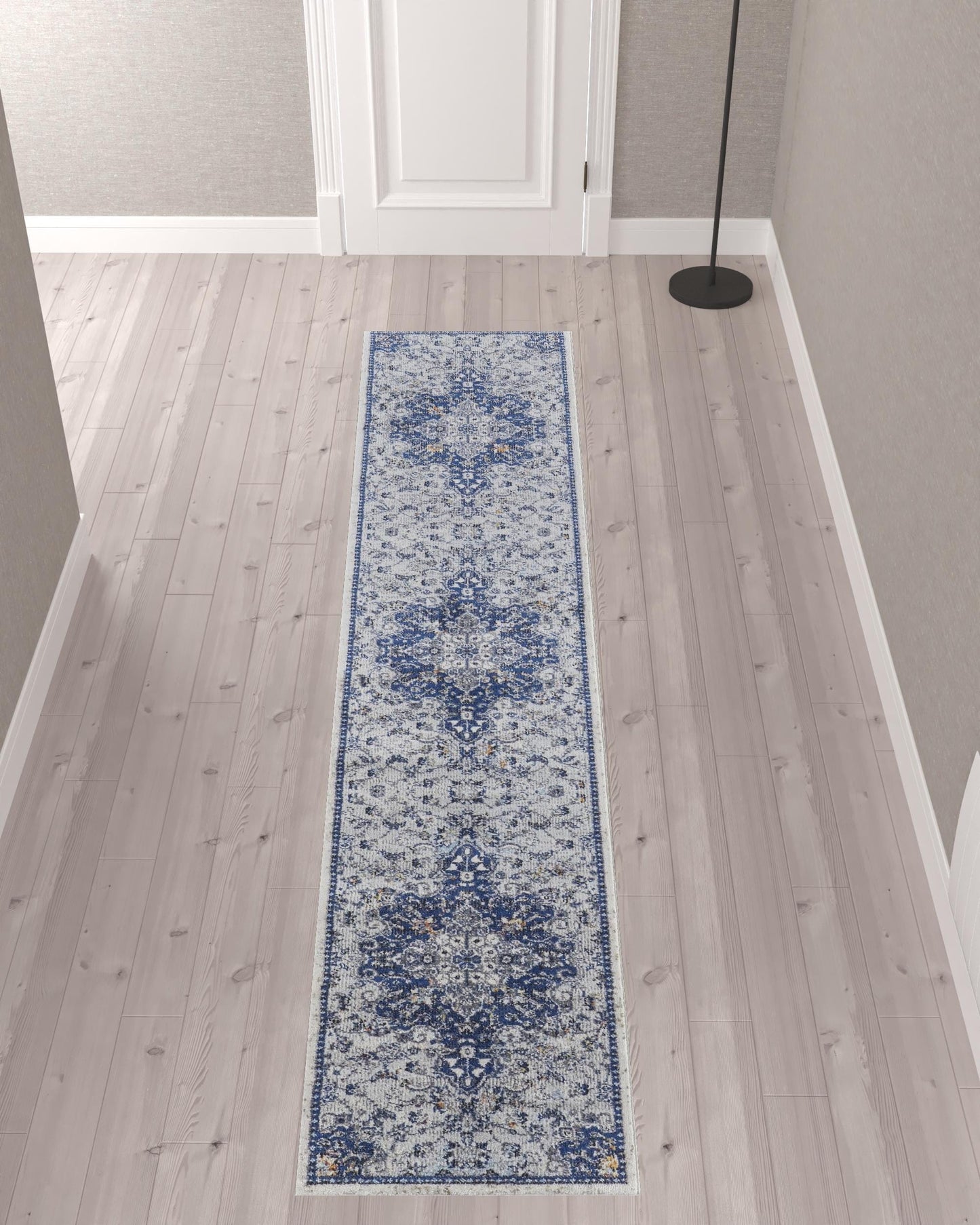 5' X 8' Gray Ivory And Blue Floral Power Loom Distressed Stain Resistant Area Rug