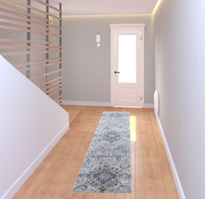 5' X 8' Ivory Taupe And Blue Floral Power Loom Distressed Stain Resistant Area Rug