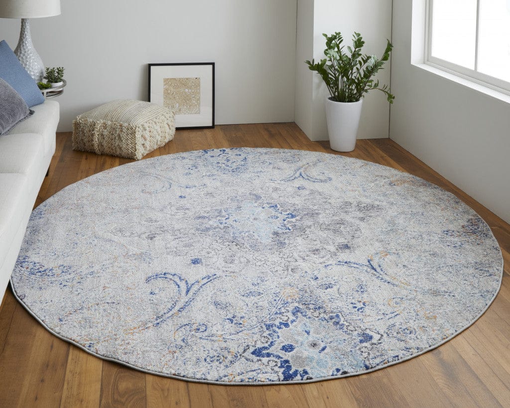 5' X 8' Ivory Taupe And Blue Floral Power Loom Distressed Stain Resistant Area Rug