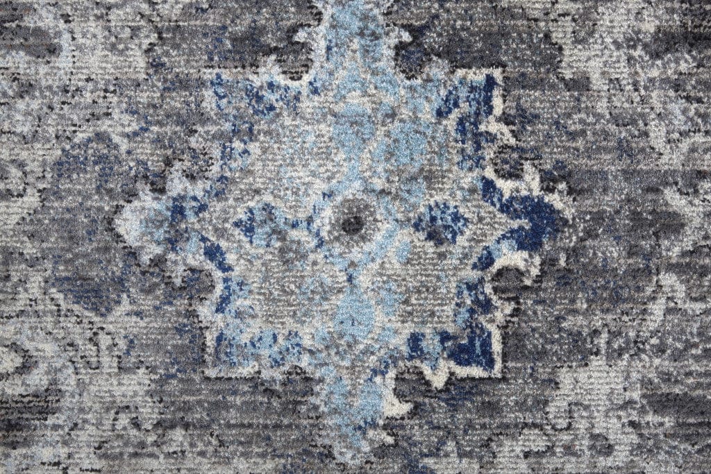 5' X 8' Ivory Taupe And Blue Floral Power Loom Distressed Stain Resistant Area Rug