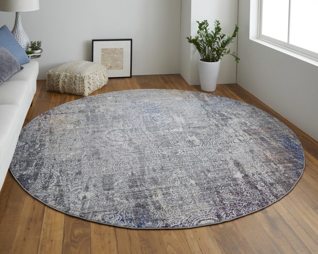 5' X 8' Taupe Blue And Ivory Abstract Power Loom Distressed Stain Resistant Area Rug