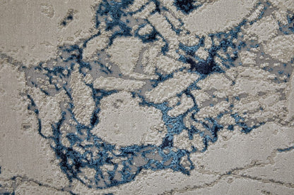 8' Ivory Blue And Black Abstract Power Loom Distressed Runner Rug