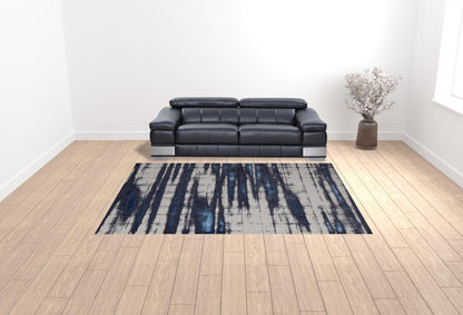 4' X 6' Ivory Blue And Gray Abstract Power Loom Distressed Area Rug